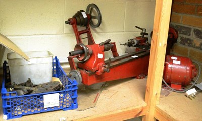 Lot 16 - Myford Models Makers Lathe ML3 (c1935) red, together with various associated fittings