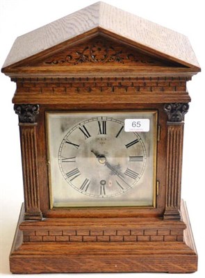 Lot 65 - NER Oak Cased Mantel Clock with metal dial inscribes NER 893 5";, 13cm diameter in decorated...