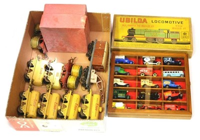 Lot 121 - Hornby O Gauge Rolling Stock including five Esso tank wagons buff, BP Motor Spirit tank wagon, No.2