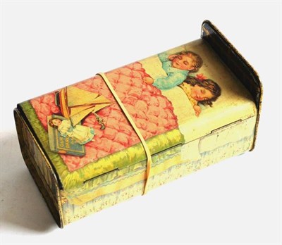 Lot 152 - Gray Dunn & Co (Glasgow) Biscuit Tin 'Our Darlings' in the form a a bed, brightly lithographed with