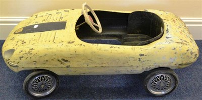 Lot 282 - Triang E-Type Jaguar Pedal Car appears to have been dark blue originally but has been...