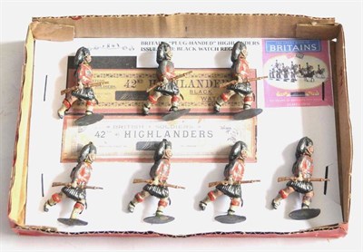 Lot 309 - Britains Plug-Handed Highlanders (Black Watch) running with rifles at the trail, on oval bases (all