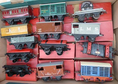 Lot 41 - Hornby O-Gauge A Collection Of Locomotives And Rolling Stock, two clockwork 0-4-0 locomotives...