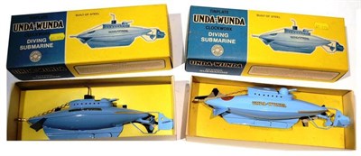 Lot 124 - Two Boxed Sutcliffe Clockwork Tinplate Unda-Wunda Diving Submarines, in blue and yellow card boxes