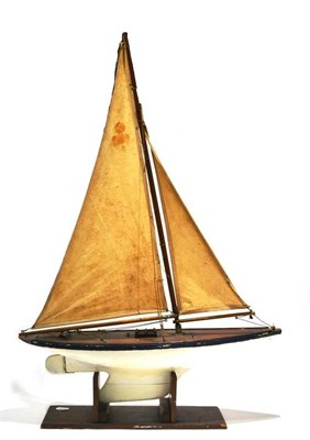 Lot 146 - John Alexander (Preston) Pond Yacht with wooden hull and nicely patinated deck, twin sails on...