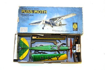 Lot 200 - A Boxed Frog Puss Moth Monoplane, flying scale model of the De Havilland 80A, with accessories...