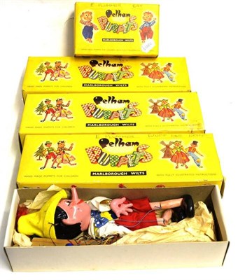 Lot 202 - Pelham Puppets Bengo, Pinocchio, Witch, Wuff and Cat (all G-E boxes G, all have some graffiti) (5)