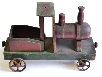 Lot 211 - Triang Or Similar An Early Wooden Floor Train, of simple form with raise boiler and five spoked...