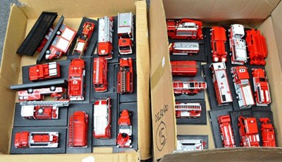 Lot 220 - Sixty Del Prado Fire Service Vehicles, mounted on plastic bases, in four boxes