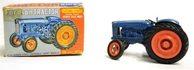 Lot 249 - Clifford Series (Empire Made) Fordson Tractor diecast in blue with orange wheels, overall Excellent