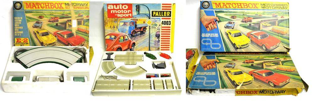 Lot 270 - Matchbox Two M2 Motorised Motorway Sets,  E2 Motorway Extension and a Faller 4003 Auto Motor...