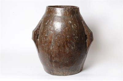 Lot 1210 - A Carved Hardwood One Piece Large Two-Handled Storage Vessel, perhaps South East Asian, of...