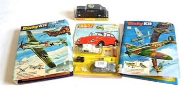 Lot 299 - Dinky Kits, 1003 Volkswagen 1300 Sedan, 1044 Messerschmitt Bf109E and 1042 Spitfire all still...