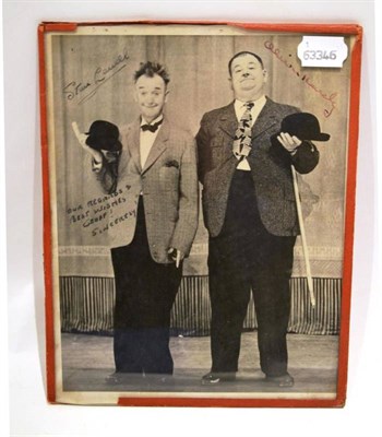 Lot 332 - A Signed Photograph of Stan Laurel and Oliver Hardy, inscribed 'Our Regards & Best Wishes...