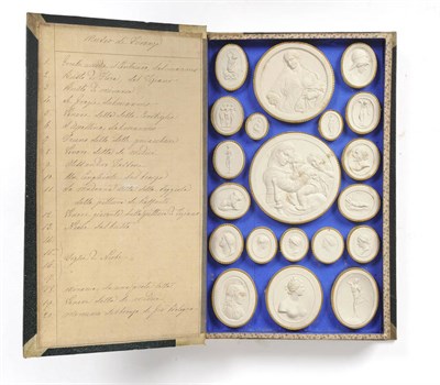 Lot 1219 - Grand Tour: A Bookform Box of Thirty-Nine Classical Plaster Seals, J Paoletti, Impronte, early 19th