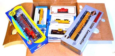 Lot 30 - A Collection of Boxed 'HO' Gauge American Railroad Trains, comprising Althern Santa Fe Railroad...