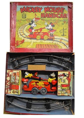 Lot 33 - A Boxed Wells O London 'O' Gauge Clockwork Tinplate Mickey Mouse Handcar, with celluloid...