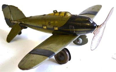 Lot 40 - A Clockwork Tinplate Model of a German Military Aircraft, lithographed in green and black,...