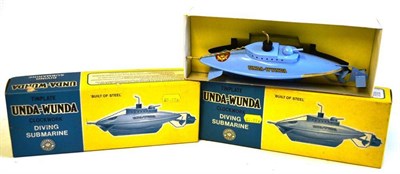 Lot 52 - Two Boxed Sutcliffe Clockwork Tinplate Unda-Wunda Diving Submarines, in blue and yellow card boxes