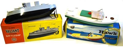 Lot 54 - Two Boxed Sutcliffe Clockwork Tinplate Boats - Valiant Battleship and Hawk Speedboat