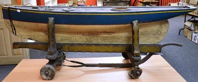 Lot 58 - A Large Wooden Pond Yacht Hull, painted blue and white, with lead keel, length 172cm, on a...
