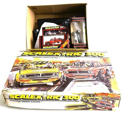Lot 84 - A Boxed Scalextric 300 Slot Racing Set No.C534, containing two racing minis, track and accessories