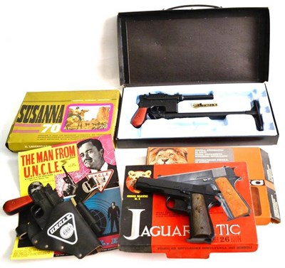 Lot 90 - Five Boxed Toy Pistols - Man From U.N.C.L.E 7.63mm automatic in a case, another similar 'U.N.C.L.E'