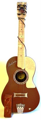 Lot 99 - A Boxed Elvis Presley Plastic Toy Guitar by Selcol, in brown and white plastic, with auto-chord...