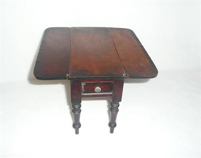 Lot 1229 - A Miniature Mahogany Pembroke Table, circa 1860, crossbanded, a frieze drawer to each end, on...