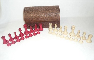 Lot 1230 - A Jacques Natural and Red Stained Ivory Chess Set, probably late 19th century, the natural...