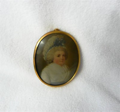 Lot 1236 - H Stubble: Portrait Miniature of Ann White, 1797, wearing a blue ribbon trimmed lace headpiece...