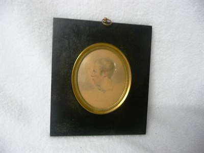 Lot 1237 - John Timmeau: Portrait Miniature of a Young Gentleman, circa 1820, turning sharply to dexter,...