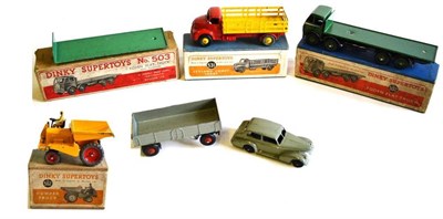 Lot 209 - Four Boxed Dinky Supertoys Commercial Vehicles - Foden Flat Truck No.502, in green, with silver...