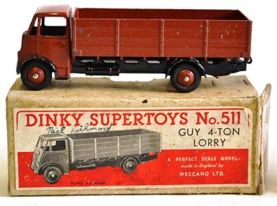 Lot 217 - A Boxed Dinky Supertoys Guy 4-Ton Lorry No.511, 1st cab type, with brown cab, back and hubs,...