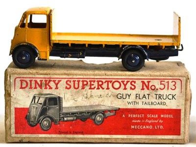 Lot 219 - A Boxed Dinky Supertoys Guy Flat Truck with Tailboard No.513, 1st cab type, with yellow cab and...