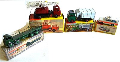 Lot 225 - Four Boxed Dinky Commercial Vehicles - Refuse Wagon No.978, Jones Crane No.970, Police Range...