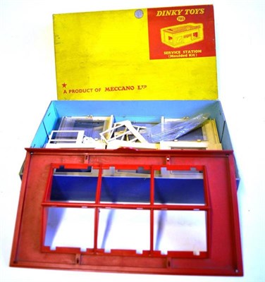 Lot 228 - A Boxed Dinky Service Station (Moulded Kit) No.785, the unmade parts in fawn and red plastic,...