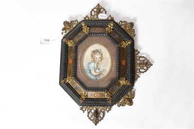 Lot 1248 - Portrait Miniature of a Pretty Young Girl: Painted Pottery Oval Plaque, probably French, circa...