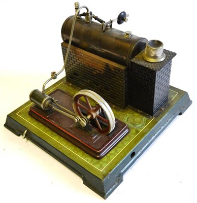 Lot 49 - A Tinplate Stationary Steam Plant, with single cylinder engine, horizontal copper boiler, on a...