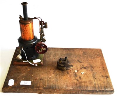 Lot 52 - A Single Cylinder Stationary Steam Engine, with vertical copper boiler, pierced flywheel, on a...