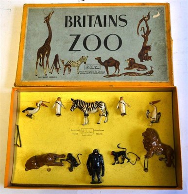 Lot 116 - A Boxed Britains Lead Zoo Set No.1z, containing ten animals - zebra, two penguins, two storks, lion
