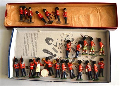 Lot 139 - A Boxed Britains Lead Irish Guards Present Arms Set No.2078, containing seven figures, in a...