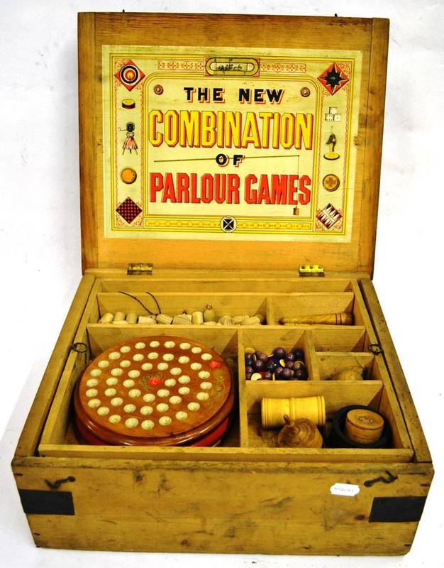 Lot 163 - A Boxed 'New Combination of Parlour Games' Compendium, containing Aunt Sally toy, hoopla,...
