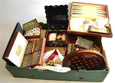 Lot 168 - A Collection of Early Toys, including a 19th century lacquered box containing ivory gaming...