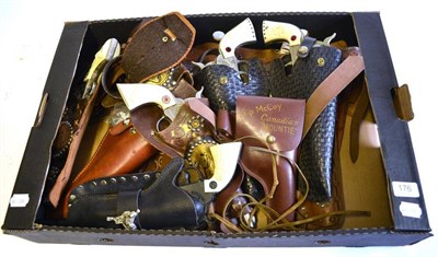 Lot 176 - Four Pairs of Toy Cowboy Guns in Leather Holsters - Lone Ranger, Gene Autrey, Six Gun and...