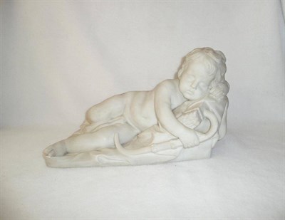 Lot 1266 - Italian School: A White Marble Figure of the Sleeping Infant Cupid, 19th century, recumbent amongst