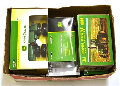 Lot 213 - A Collection of Boxed Diecast Models of Tractors, including twenty five Britains window boxes,...