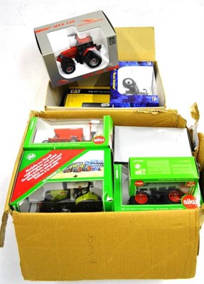 Lot 215 - A Collection of Boxed Diecast Models of Tractors, makers include Ertl, Universal Hobbies,...