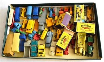 Lot 241 - A Collection of Unboxed Matchbox Vehicles, including cars and commercials, together with four empty