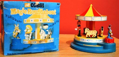Lot 250 - A Boxed Corgi Magic Roundabout Carousel No.852, with musical movement and five figures, in...